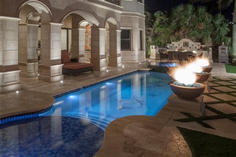 Mediterranean Patio Features Luxurious Swimming Pool And Strong