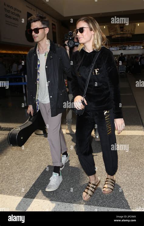 Brie Larson and her fiancé Alex Greenwald depart from Los Angeles International LAX Airport