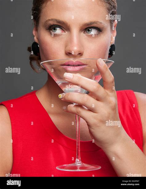 Woman Drinking Martini Contemplating Hi Res Stock Photography And