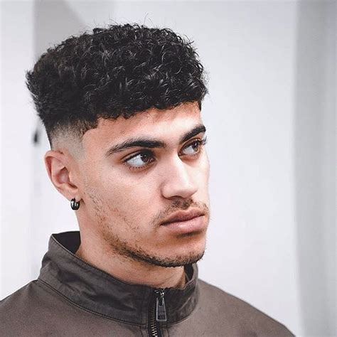 S Curl Fade Haircut Fade Haircut For Black Men High And Low Afro