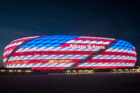 The stadium itself is amazing to see and the museum trophy collection and shop are well worth a visit. Bayern Munich lit the Allianz Arena today to resemble the American flag - Bavarian Football Works