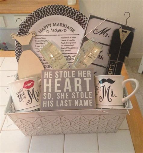 Getting engaged is one of the best feelings ever as you are ticking off the first step that will lead to a happily ever after. Diy wedding gift basket. | Wedding gift baskets, Diy ...