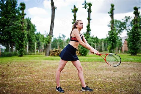 Beautiful Sport Woman Tennis Player With Racket In Sportswear Costume