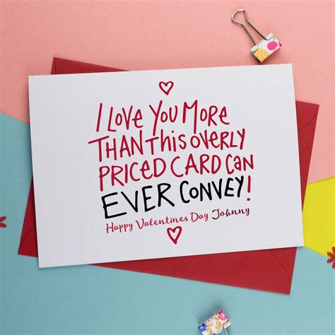 A pencil, an 8 1/2″ x 11″ (22 x 28 cm) piece of paper, scissors, 2 strips of paper each 2″ x 11″ (5 x 28 cm), clear tape or glue, colored markers, crayons, and stickers print in large letters across the length of the strip: i love you more than anything valentines card by a is for alphabet | notonthehighstreet.com