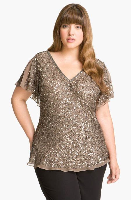 The wedding dress design in this picture has a super long train. Plus Size Dressy Tops For Wedding | Attire Plus Size
