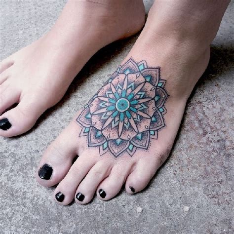 This tattoo extends halfway to your arm, leaving you with a unique design. 45 Noteworthy Foot Tattoos | Amazing Tattoo Ideas