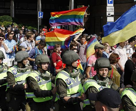 Riot Police Protect Kiev Pride March As Homophobic Protestors Burn Lgbt