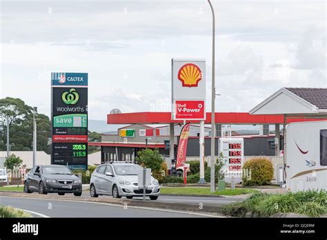 Two Petrol Service Stations A Shell And A Woolworths Caltex Situated