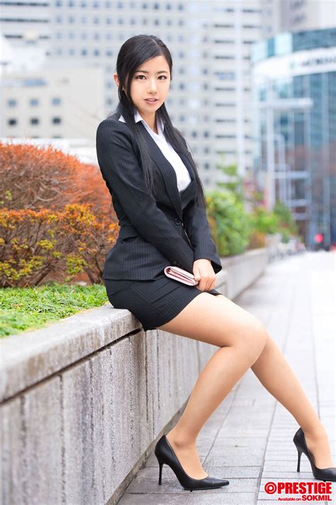 Woman In Suit In Office