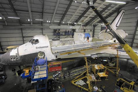 Space Shuttle Endeavour Inches Closer To Completion Of Final Exhibit