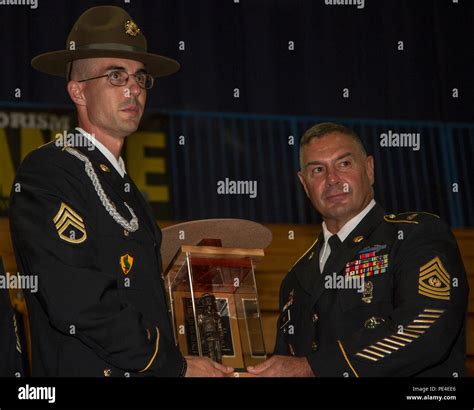 Command Sgt Maj Robert J Riti Presents The Ralph E Haines Jr Award