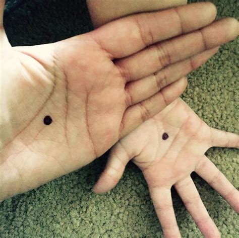 Whats The Meaning Of The Black Dot On A Hand