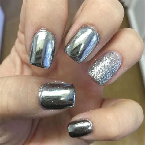 Silver Chrome Nails With Silver Glitter Accent Nail Silver Sparkly