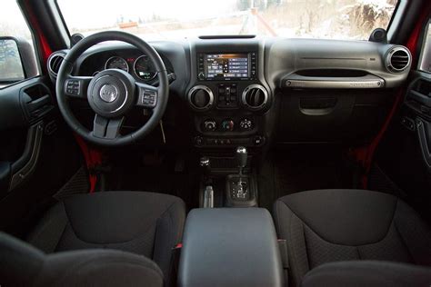 The cloth seats are easy to clean, and the removable carpet makes it easy for cleaning up spills, or sudden rain storms when you don't have the. 2015 Jeep Wrangler Unlimited review | Digital Trends