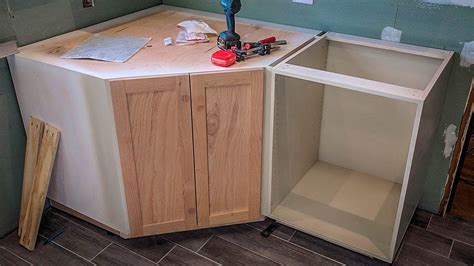 The main cabinet boxes themselves i built out of 2x4s and 3 inch long screws, they would not be going anywhere. How I made a Kitchen Corner Cabinet | NewAir G73 Review ...