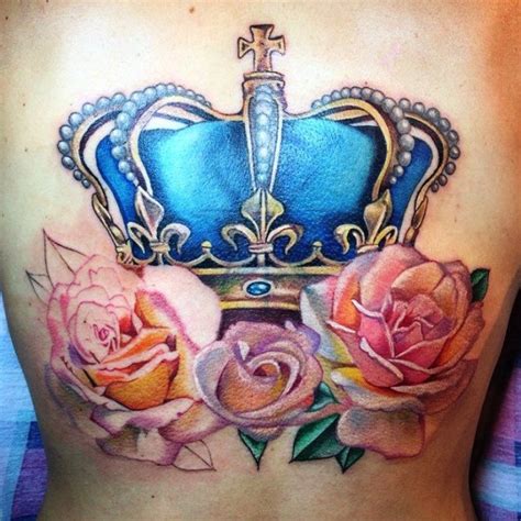 A Tattoo With Roses And A Crown On It