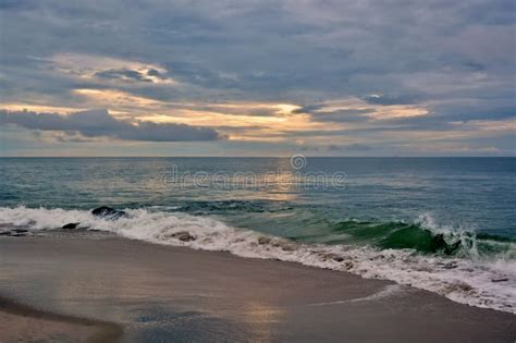 Heavenly Skies And Reflective Seas At Dawn Stock Image Image Of