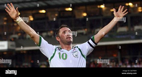 Sport Football Celebrating Arms Raised Robbie Keane Hi Res Stock