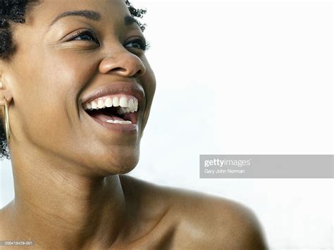 Young Woman Smiling Side View Closeup Photo Getty Images