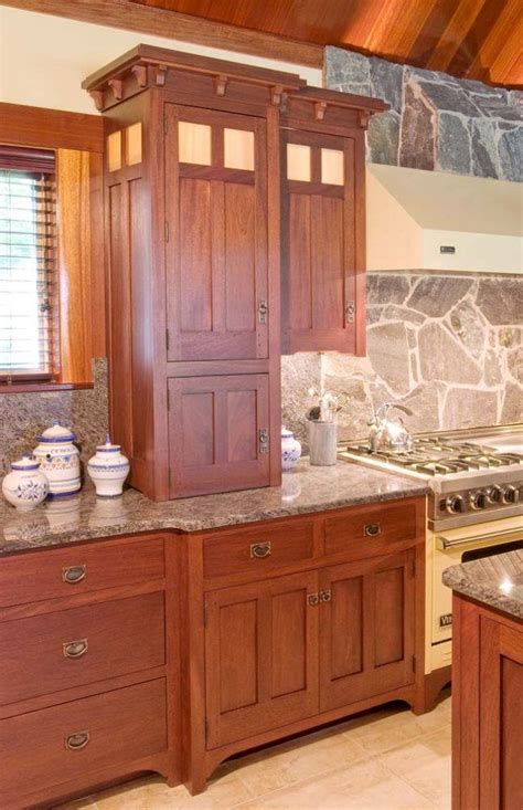 The types of hardwood often used for closets consists of oak, hickory, maple and cherry. Mission Style Kitchen Cabinets | Top cabinet doors are a cross design. Glass in top cabinet ...