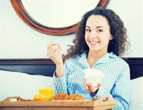 Brunette Girl Having Breakfast In Bed And Smiling Stock Photo Image