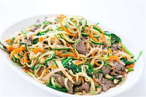 Includes an easy zucchini noodles recipe, how to avoid watery zoodles. Korean Japchae Zucchini Noodles Recipe