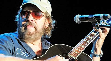 Waylon Jennings And Johnny Cash Get Immortalized By Hank Jr In Acoustic