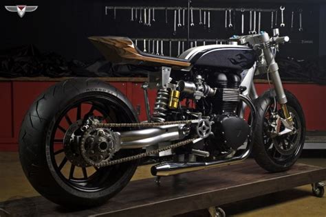 There are a few bikes out there, a tiny handful, that have slipped under the custom bmw's mighty r1100 rs sport tourer is one of them: Cafe Racers: Motorcyles, Workshops & Custom Bike Builders
