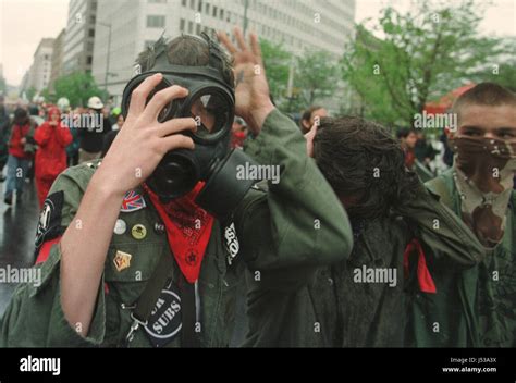 Punk Rock Protester Adjusting Mask Protesters Block Streets And Protest Against Banks And