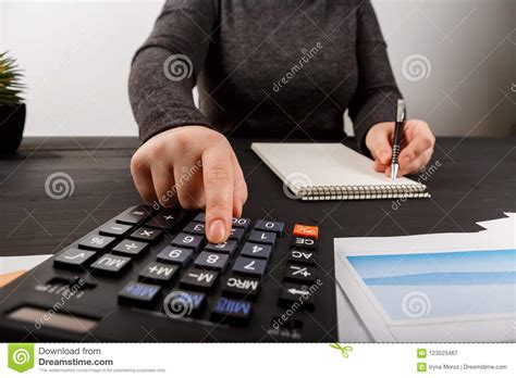 Close Up Of Female Accountant Or Banker Making Calculations Stock Image Image Of Concept