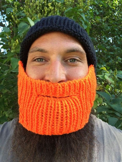 I created this crochet santa beard hat pattern for my adorable little boy, i included a few sizes for the pattern, i used the crochet double loop pattern to make it more of a full beard! Knit Beard Hat Black with Orange Beard | Etsy | Knitted ...