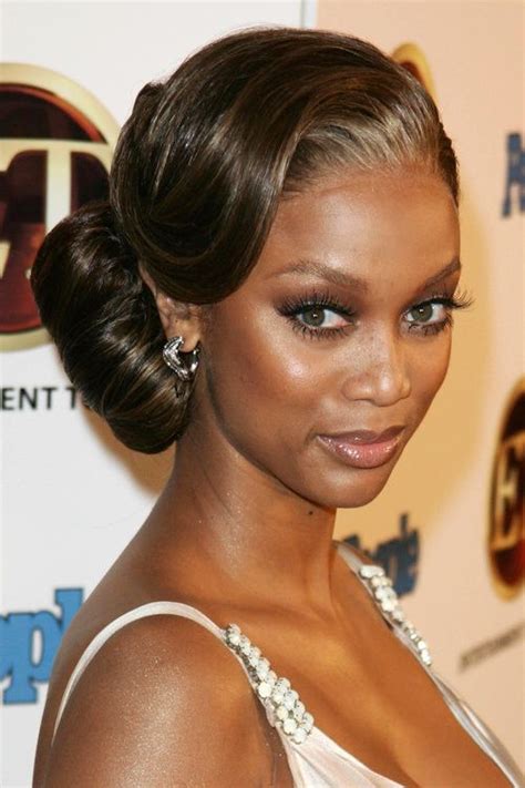 Delicate Celebrity Bun Hairstyles 2015 Summer African American Updo
