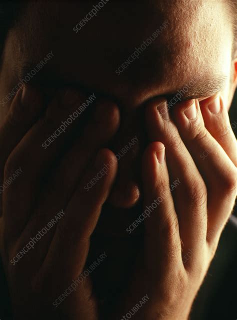 Stressed Or Depressed Man Holds His Eyes Stock Image