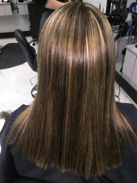 It's a bold color choice and often comes packed with dimension. Ash brown blonde highlights straight long … | Brown blonde ...