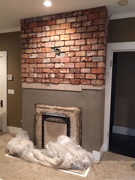 A Vintage Bricks Fireplace Installation In 2021 Brick Tiles
