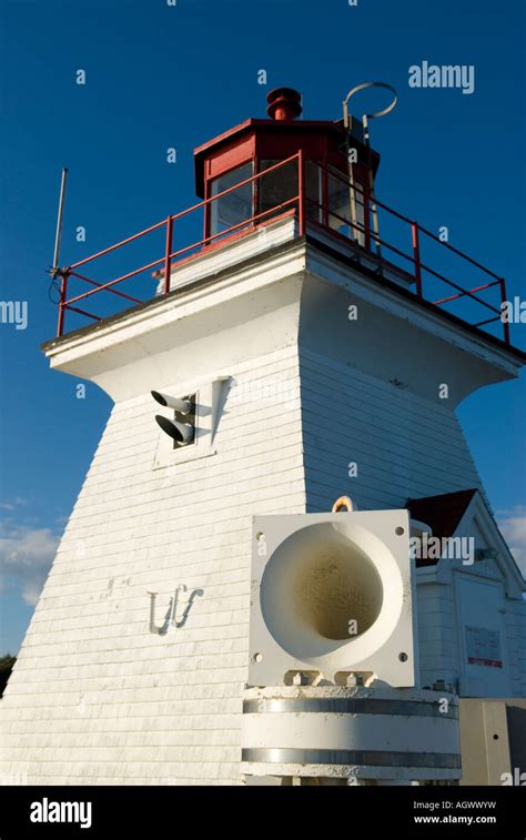 Lighthouse At Cape Enrage New Brunswick Stock Photo Alamy