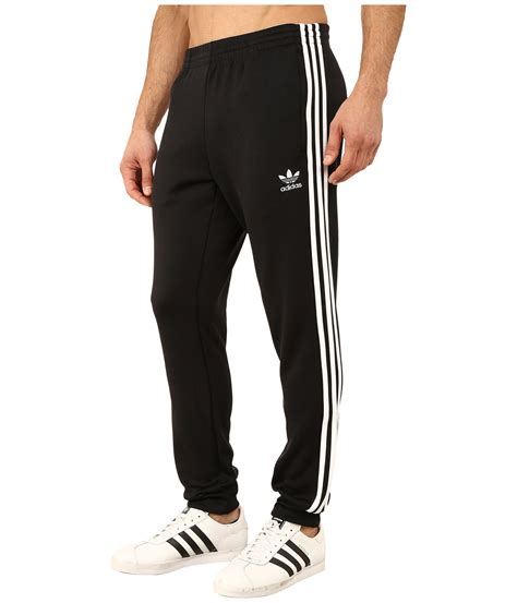 Adidas Originals Superstar Cuffed Track Pants In Black For Men Lyst