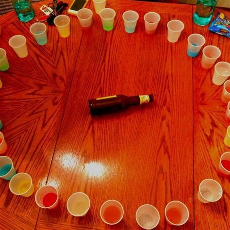 spin the bottle with shots directions fill plastic cups with a variety of beverages could be