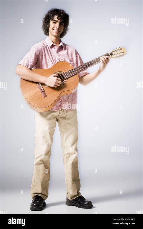 Portrait Of A Teenage Boy Playing The Guitar Stock Photo Alamy