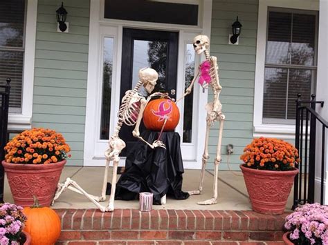 Couple Decorates House With Skeleton Scenes Halloween Outdoor