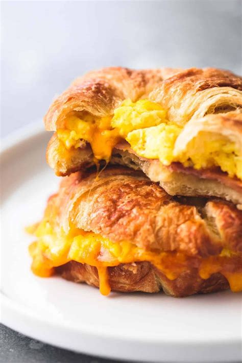 Baked Croissant Breakfast Sandwiches Made With Fluffy And Cheesy