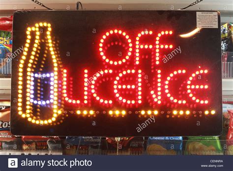 Neon Off Licence Sign In A Newsagents Shop Window Advertising Alcohol