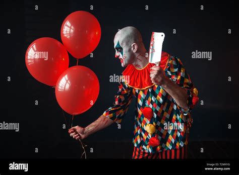 Scary Bloody Clown With Meat Cleaver And Air Balloon Sneaking Into The