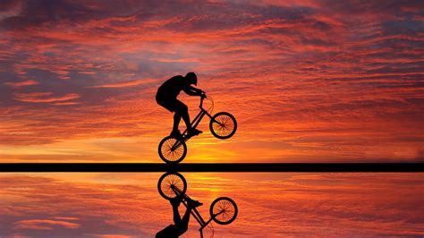 Men Outdoors Bicycle Wheelie Silhouette Mirrored Sunset Bmx Sky