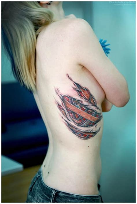 This is your life, at this time. 30 Ridiculous Skin Ripping Tattoo Designs