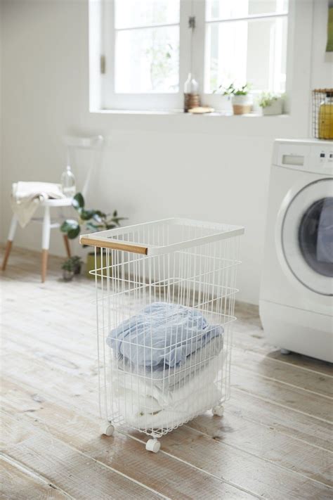 A Functional Laundry Basket Yamazaki Home Slim Rolling Laundry Basket