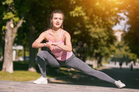Fit Fitness Woman Doing Stretching Exercises Outdoors At Park Stock Image Image Of Nature