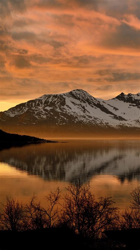 Sunset In Grøtfjord Troms County Snowy Mountain On Vengsøy Norway