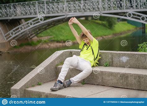 Sad Young Teenager Sitting Alone In The Summer Park Stock Photo - Image of teenager, tshirt ...