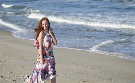 Beautiful Young Woman At Beach Redhead On Boardwalk Stock Image